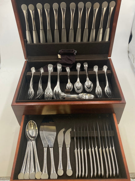 Rare Puiforcat Stainless Steel Flatware Set in Wave Pattern in Art Deco Style