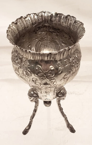 Pair of Silver Footed Vases With Flowers and Bows