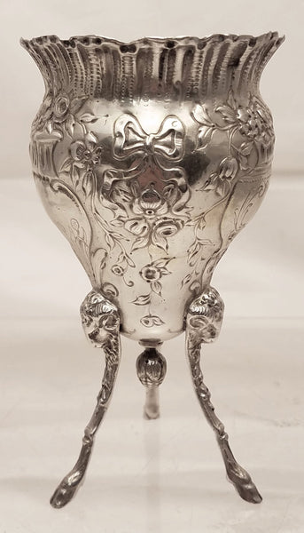 Pair of Silver Footed Vases With Flowers and Bows