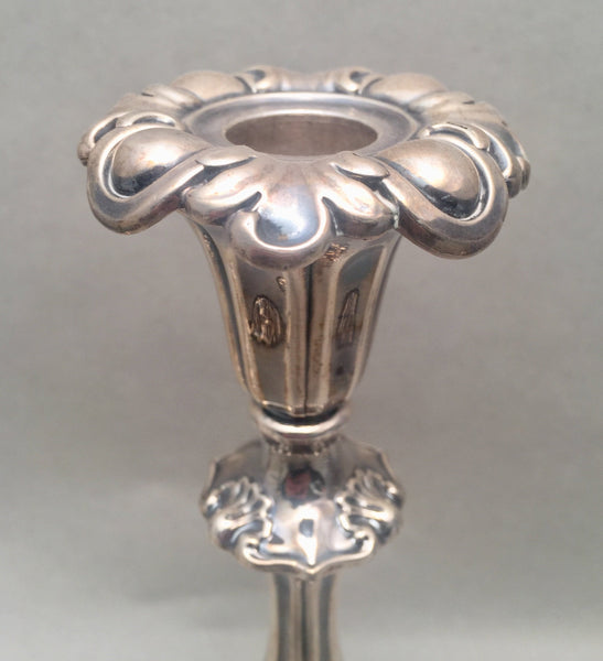 Set of Four English Victorian Sterling Candlesticks